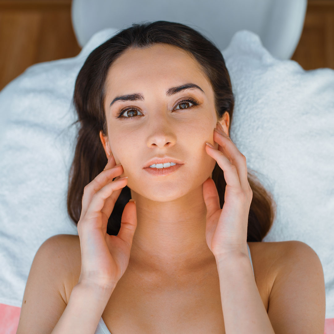 Patient on treatment table in cosmetician